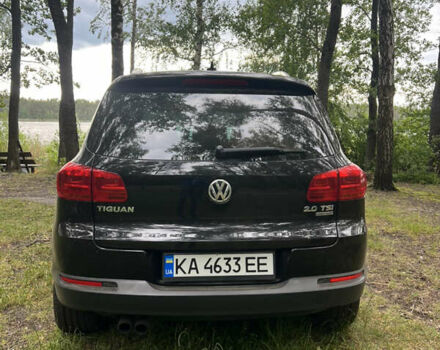 Чорний Фольксваген Тігуан, об'ємом двигуна 2 л та пробігом 330 тис. км за 9600 $, фото 4 на Automoto.ua
