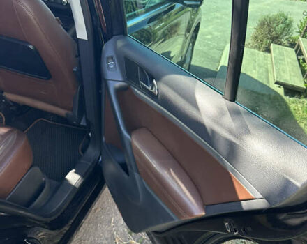 Чорний Фольксваген Тігуан, об'ємом двигуна 1.97 л та пробігом 231 тис. км за 15000 $, фото 6 на Automoto.ua