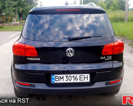 Чорний Фольксваген Тігуан, об'ємом двигуна 2 л та пробігом 183 тис. км за 12500 $, фото 4 на Automoto.ua