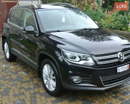 Чорний Фольксваген Тігуан, об'ємом двигуна 2 л та пробігом 168 тис. км за 15550 $, фото 1 на Automoto.ua
