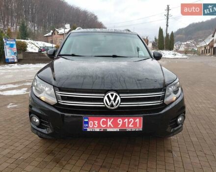Чорний Фольксваген Тігуан, об'ємом двигуна 2 л та пробігом 227 тис. км за 8999 $, фото 1 на Automoto.ua