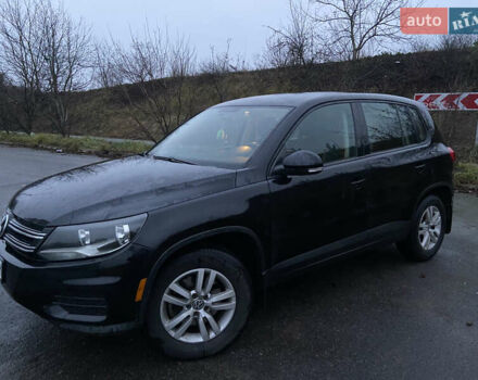 Черный Фольксваген Тигуан, объемом двигателя 1.98 л и пробегом 320 тыс. км за 11500 $, фото 1 на Automoto.ua