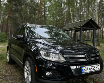 Чорний Фольксваген Тігуан, об'ємом двигуна 2 л та пробігом 330 тис. км за 9600 $, фото 1 на Automoto.ua