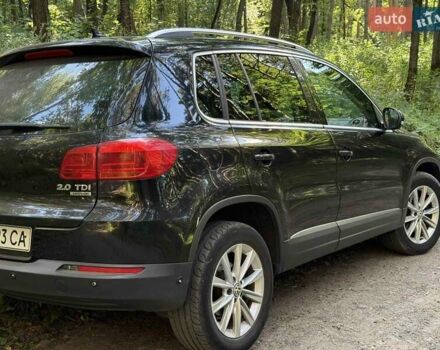 Черный Фольксваген Тигуан, объемом двигателя 1.97 л и пробегом 270 тыс. км за 11500 $, фото 1 на Automoto.ua