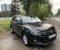 Черный Фольксваген Тигуан, объемом двигателя 2 л и пробегом 130 тыс. км за 10200 $, фото 1 на Automoto.ua