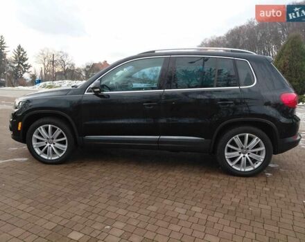 Чорний Фольксваген Тігуан, об'ємом двигуна 2 л та пробігом 227 тис. км за 8999 $, фото 7 на Automoto.ua