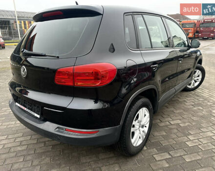 Чорний Фольксваген Тігуан, об'ємом двигуна 2 л та пробігом 165 тис. км за 9499 $, фото 2 на Automoto.ua
