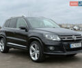 Чорний Фольксваген Тігуан, об'ємом двигуна 2 л та пробігом 234 тис. км за 15500 $, фото 1 на Automoto.ua