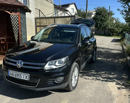Чорний Фольксваген Тігуан, об'ємом двигуна 1.97 л та пробігом 231 тис. км за 15000 $, фото 1 на Automoto.ua