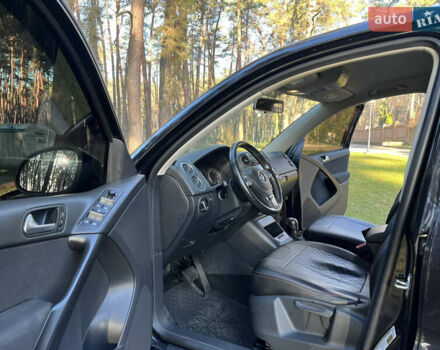 Черный Фольксваген Тигуан, объемом двигателя 2 л и пробегом 185 тыс. км за 11500 $, фото 23 на Automoto.ua