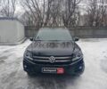 Черный Фольксваген Тигуан, объемом двигателя 2 л и пробегом 166 тыс. км за 15490 $, фото 1 на Automoto.ua
