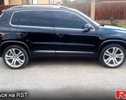 Чорний Фольксваген Тігуан, об'ємом двигуна 2 л та пробігом 183 тис. км за 12500 $, фото 2 на Automoto.ua