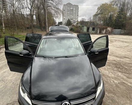 Черный Фольксваген Тигуан, объемом двигателя 1.98 л и пробегом 210 тыс. км за 10500 $, фото 2 на Automoto.ua