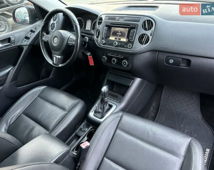 Черный Фольксваген Тигуан, объемом двигателя 2 л и пробегом 256 тыс. км за 8999 $, фото 12 на Automoto.ua