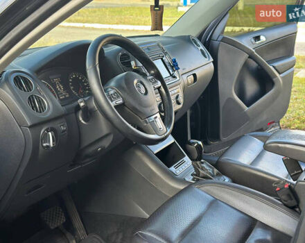 Чорний Фольксваген Тігуан, об'ємом двигуна 2 л та пробігом 189 тис. км за 10300 $, фото 6 на Automoto.ua