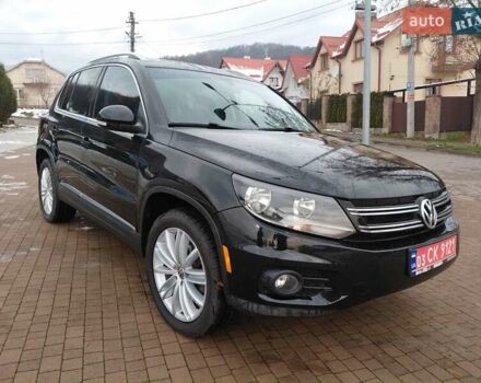 Чорний Фольксваген Тігуан, об'ємом двигуна 2 л та пробігом 227 тис. км за 8999 $, фото 2 на Automoto.ua
