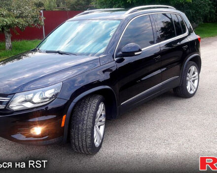 Чорний Фольксваген Тігуан, об'ємом двигуна 2 л та пробігом 183 тис. км за 12500 $, фото 1 на Automoto.ua