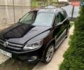 Черный Фольксваген Тигуан, объемом двигателя 1.98 л и пробегом 220 тыс. км за 13400 $, фото 1 на Automoto.ua
