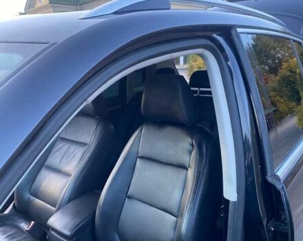 Чорний Фольксваген Тігуан, об'ємом двигуна 1.99 л та пробігом 180 тис. км за 11300 $, фото 54 на Automoto.ua