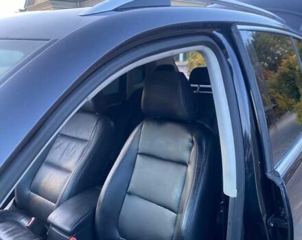 Чорний Фольксваген Тігуан, об'ємом двигуна 1.99 л та пробігом 180 тис. км за 11300 $, фото 52 на Automoto.ua