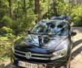 Чорний Фольксваген Тігуан, об'ємом двигуна 2 л та пробігом 230 тис. км за 14500 $, фото 1 на Automoto.ua