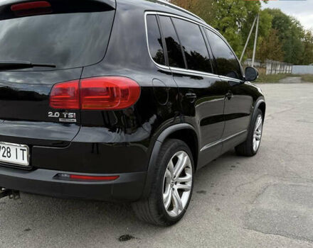 Чорний Фольксваген Тігуан, об'ємом двигуна 2 л та пробігом 200 тис. км за 12900 $, фото 3 на Automoto.ua