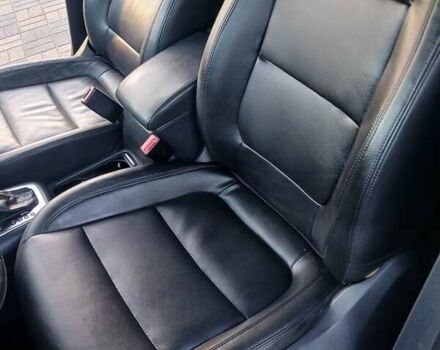 Чорний Фольксваген Тігуан, об'ємом двигуна 1.99 л та пробігом 180 тис. км за 11300 $, фото 65 на Automoto.ua