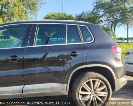 Чорний Фольксваген Тігуан, об'ємом двигуна 2 л та пробігом 156 тис. км за 7000 $, фото 5 на Automoto.ua