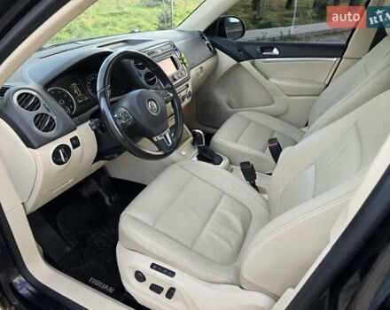 Чорний Фольксваген Тігуан, об'ємом двигуна 1.98 л та пробігом 349 тис. км за 12499 $, фото 1 на Automoto.ua