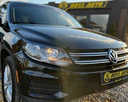 Чорний Фольксваген Тігуан, об'ємом двигуна 2 л та пробігом 200 тис. км за 10999 $, фото 1 на Automoto.ua