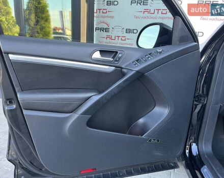 Чорний Фольксваген Тігуан, об'ємом двигуна 2 л та пробігом 159 тис. км за 14950 $, фото 10 на Automoto.ua