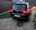 Черный Фольксваген Тигуан, объемом двигателя 1.98 л и пробегом 180 тыс. км за 11850 $, фото 1 на Automoto.ua