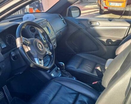 Чорний Фольксваген Тігуан, об'ємом двигуна 2 л та пробігом 231 тис. км за 12000 $, фото 2 на Automoto.ua