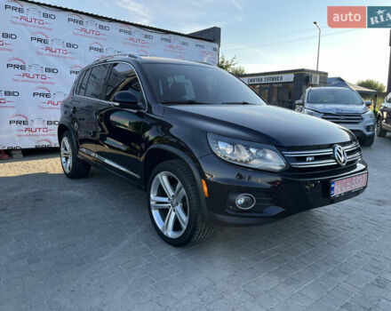 Чорний Фольксваген Тігуан, об'ємом двигуна 2 л та пробігом 159 тис. км за 14950 $, фото 2 на Automoto.ua