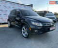 Чорний Фольксваген Тігуан, об'ємом двигуна 2 л та пробігом 159 тис. км за 14950 $, фото 2 на Automoto.ua