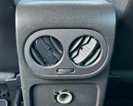 Чорний Фольксваген Тігуан, об'ємом двигуна 2 л та пробігом 200 тис. км за 10999 $, фото 2 на Automoto.ua