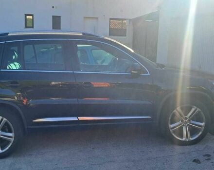 Чорний Фольксваген Тігуан, об'ємом двигуна 2 л та пробігом 231 тис. км за 12000 $, фото 1 на Automoto.ua