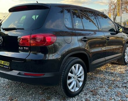 Чорний Фольксваген Тігуан, об'ємом двигуна 2 л та пробігом 200 тис. км за 10999 $, фото 5 на Automoto.ua