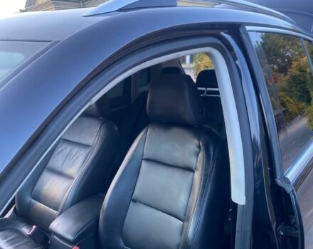 Чорний Фольксваген Тігуан, об'ємом двигуна 2 л та пробігом 182 тис. км за 11200 $, фото 6 на Automoto.ua