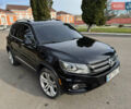 Черный Фольксваген Тигуан, объемом двигателя 2 л и пробегом 206 тыс. км за 12100 $, фото 1 на Automoto.ua