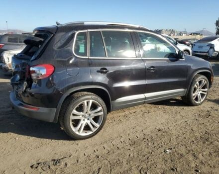 Чорний Фольксваген Тігуан, об'ємом двигуна 2 л та пробігом 172 тис. км за 9900 $, фото 5 на Automoto.ua