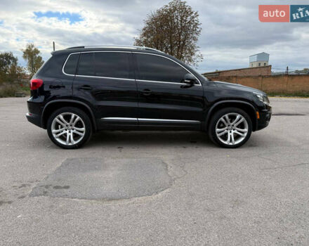 Чорний Фольксваген Тігуан, об'ємом двигуна 2 л та пробігом 200 тис. км за 12900 $, фото 1 на Automoto.ua