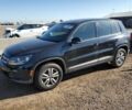 Черный Фольксваген Тигуан, объемом двигателя 2 л и пробегом 118 тыс. км за 1200 $, фото 1 на Automoto.ua