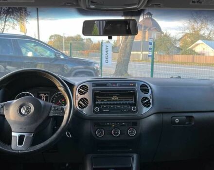 Чорний Фольксваген Тігуан, об'ємом двигуна 2 л та пробігом 200 тис. км за 10999 $, фото 10 на Automoto.ua