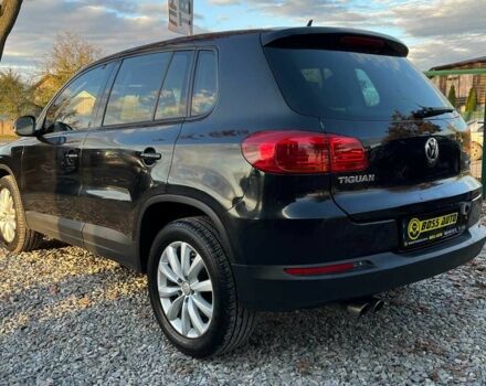Чорний Фольксваген Тігуан, об'ємом двигуна 2 л та пробігом 200 тис. км за 10999 $, фото 7 на Automoto.ua