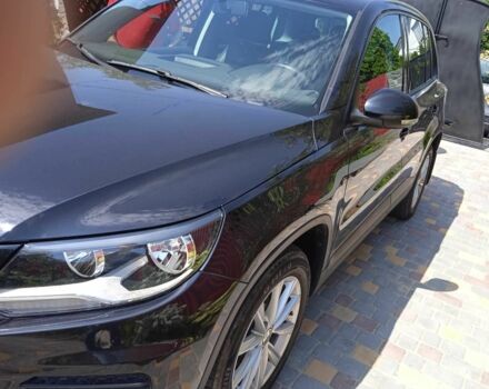 Чорний Фольксваген Тігуан, об'ємом двигуна 2 л та пробігом 200 тис. км за 12700 $, фото 2 на Automoto.ua