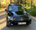 Чорний Фольксваген Тігуан, об'ємом двигуна 2 л та пробігом 190 тис. км за 13000 $, фото 1 на Automoto.ua
