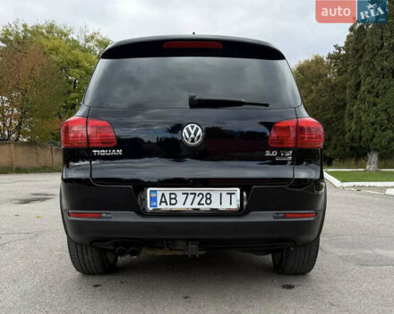 Чорний Фольксваген Тігуан, об'ємом двигуна 2 л та пробігом 200 тис. км за 12900 $, фото 2 на Automoto.ua