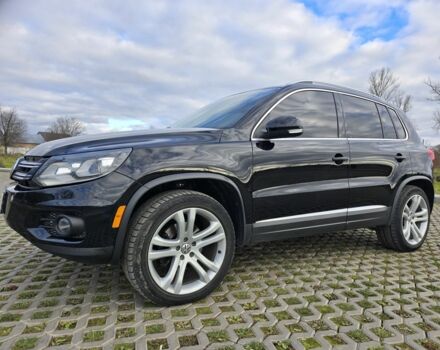 Чорний Фольксваген Тігуан, об'ємом двигуна 2 л та пробігом 194 тис. км за 12499 $, фото 1 на Automoto.ua