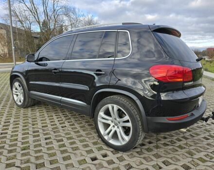 Чорний Фольксваген Тігуан, об'ємом двигуна 2 л та пробігом 194 тис. км за 12499 $, фото 5 на Automoto.ua